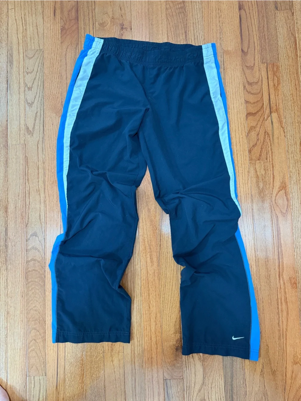 Nike Black Track Pants with Blue Side Stripes